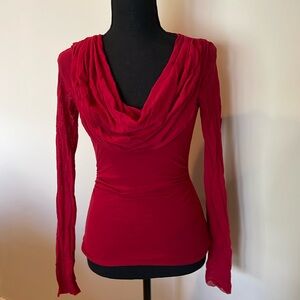 Beautiful color red top. Gathering around waist. Stretchy material.